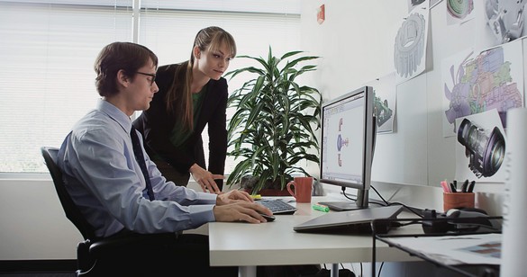 Colleagues Using Precision M3800 Workstation in Engineering Offi