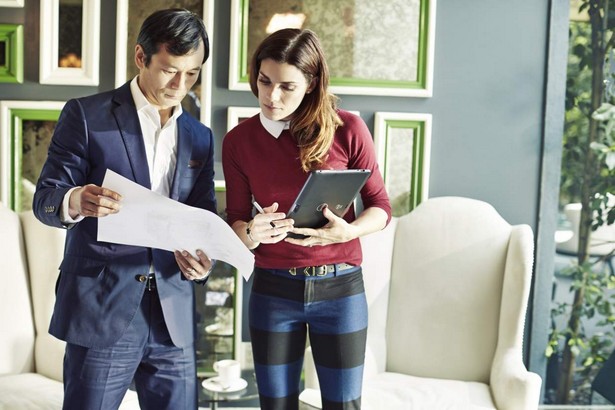 Man and Woman Using Venue 11 Pro Tablet