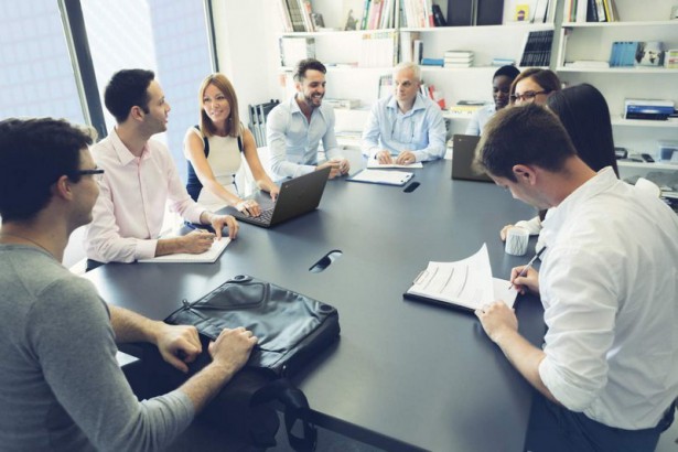 Business People in Meeting with Chromebook 11